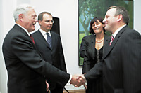 Jerzy Bankowski (right, with President Adamkus) promotes friendly relations with Poland